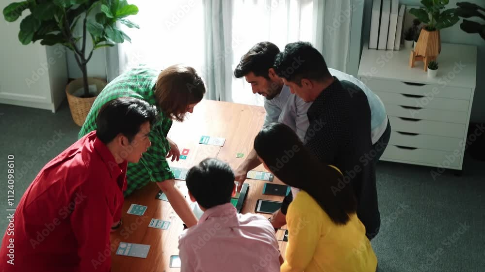Poster Top view of diverse business people discussing idea and designing system while using tablet with Ux, Ui design display on screen. Multicultural working together and planning strategy. Convocation.