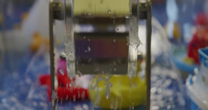 Water Droplets Splashing from Water Wheel Slow Motion