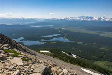 A mountain-summit with panoramic view of vast 