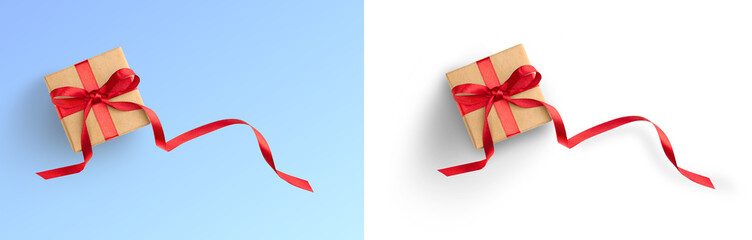 Present or gift box wrapped in brown craft paper and red ribbon on white background for mock up of card birthday or discount, sale, Christmas. Top view, png