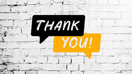 Fototapeta premium Thank You Speech bubble on white brick wall background.