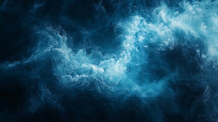 Abstract swirling blue and dark cloudscape texture.