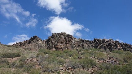 Incredible beauty of nature, mountains, river, figured stones, beautiful landscape and scenery with green grass