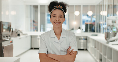Fototapeta premium Happy woman, portrait or chef with confidence at bakery for culinary art, hospitality or skill at indoor restaurant. Owner, female person or cooking artist with smile or arms crossed at shop or store