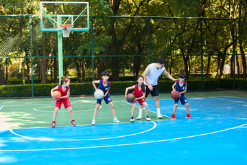 Chinese Kids Warming Up During Basketball Training Class