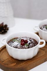 An Elegant Chocolate Dessert Beautifully Served in a White Bowl with a Garnish on Top