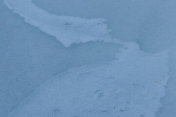 Texture of the ice surface. Winter background
