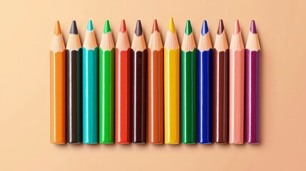 Naklejka premium Colored Pencils in a Neat Row on a Smooth Surface