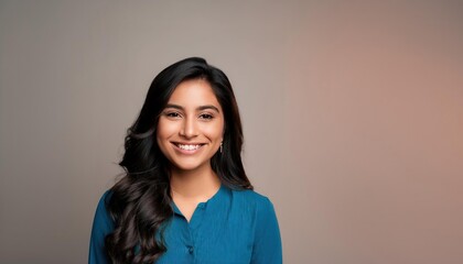 Fototapeta premium Radiant Indian Beauty with a Cheerful Smile Captured in Studio Environment