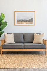 Comfortable living room setup with gray sofa and wall art in a serene space