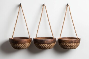 Stylish hanging multi-finish shelves with woven baskets, blending rustic charm with modern elegance.