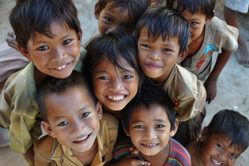 Group of happy indonesian children smiling at camera. Selective focus.