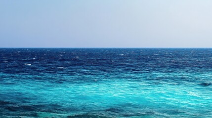 A gradient of ocean blues, from shallow turquoise to deep navy