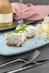 Creamy fish terrine with dill and radish garnish