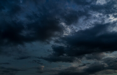 Obraz premium Cloud storm sky dark halloween background rain lightning thunder stoumy typhoon Nature light scene rainy atmosphere damage effect carbon dioxide dust air pollution 2.5 Pm, texture nature windstorm.
