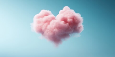 Soft Pink Cloud Shaped Like Heart Against Light Blue Background