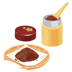 ザルに盛られた茶色の茶葉と茶筒