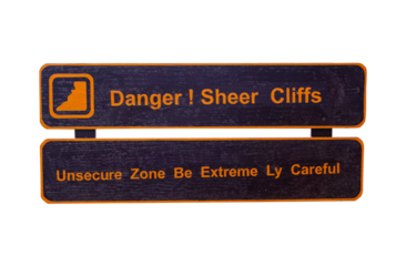 Danger Sheer Cliffs, Unsecure Zone Be Extremely Careful. Rustic wood warning wood sign dangerous drop ahead in natural tourist parks cliff edge. isolated on cut out PNG or transparent background.