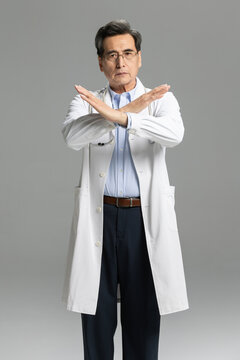 Portrait of senior male doctor