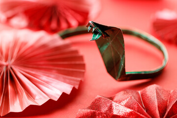 Lunar new year. paper fans on red background.