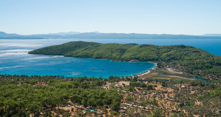 Panoramic top view of Akbuk beach in the gulf of Gokova. The coasts of the Aegean Sea. Turkey's tourist attractions and beaches. Idyllic summer season background.Mugla province, Turkey