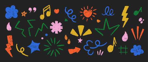 Set of emphasis symbols hand drawn with charcoal or crayon. Grunge emo doodle elements on a black background. © Arina