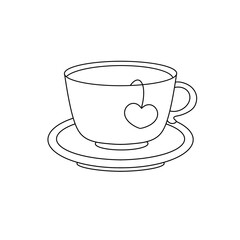 A cup with a heart on it and a tea bag in it