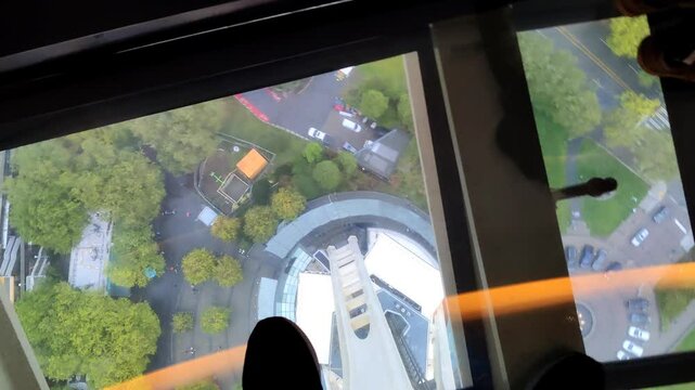Walking on the Glass Floor Observation Deck 500 Feet above Ground at Seattle Space Niddle