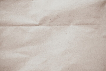 Crumpled brown paper texture background for design with copy space for text or image.	