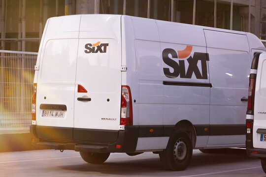 Barcelona, December 6, 2024: Sixt rent a car Company. White van with the logo on it.
