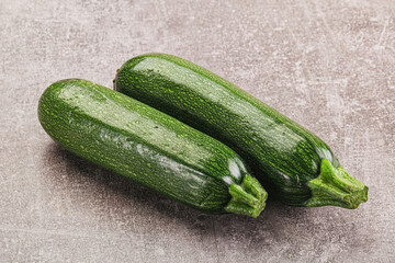 Raw green ripe zucchini vegetable