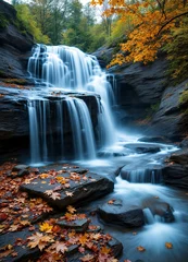 Rideaux Cascades A scenic waterfall cascading over rocky cliffs, surrounded by lush greenery and fallen autumn leaves in the foreground  © Valentin