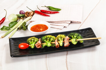 Thai Street foof satay with bacon and broccoli