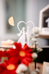 a paper cut of wedding cake