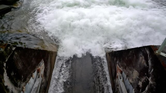 Water Flowing Out of Flood Gate Close-Up, Powerful Stream in Motion
