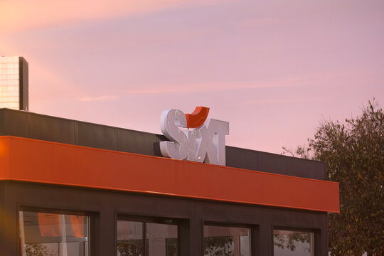 Barcelona, December 6, 2024: Sixt rent a car Company. Sign logo outdoors.