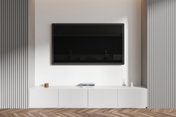 Modern living room interior with wall-mounted TV and white cabinet. 3D Rendering