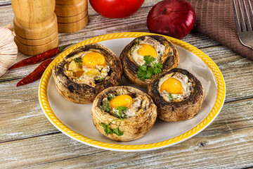 Baked champignon with quail egg