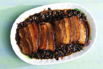 traditional chinese braised pork belly with preserved vegetables
