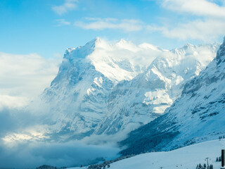 Beautiful views of the winter mountain peaks - the best place for a holiday. Grindelwald, Swiss Alps