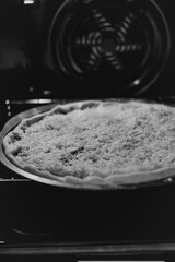 baking making pizza with cheese in an electric oven