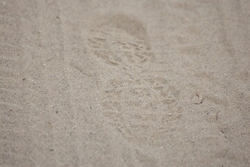 foot print (shoe print) on the sand