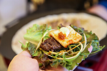 Korean barbecue food. Lettuce and beef wrap