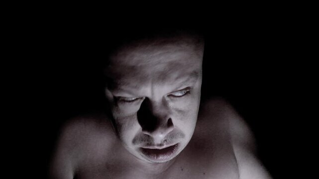 The man is going crazy, horror on his face.