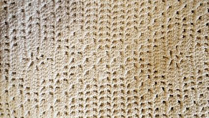 Beige Knitted Fabric Background with Textured Warmth