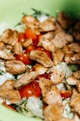 making salad with chicken tomato healthy eating food