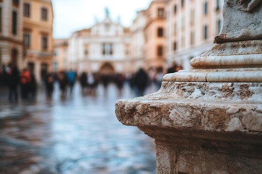 Close-up of stone detail with blurred ancient square in backgrou