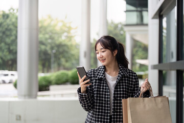 Exciting black friday shopping event urban mall image of a shopper daylight happy mood consumer culture