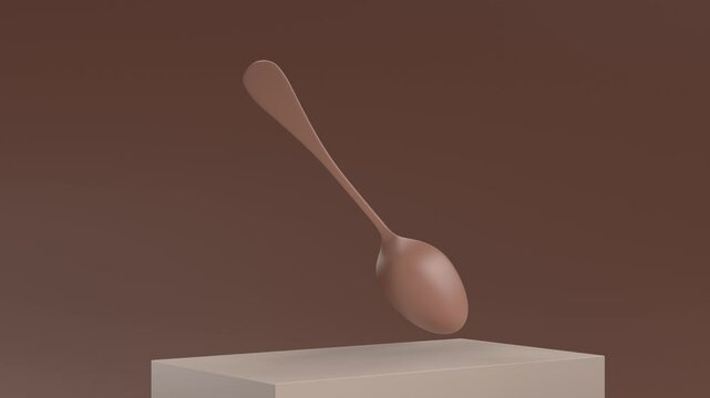 A spoon is suspended in midair above a brown surface