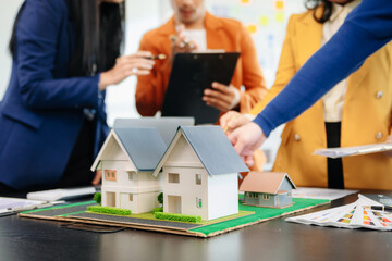 Asian Customers who choose to buy a condominium room and a bank approve a loan for their purchase.